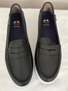 Cole Haan Black Pebbled Leather Slip-On Loafers with White Soles